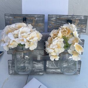 Rustic Gray Wall Sconce with Cream Flowers